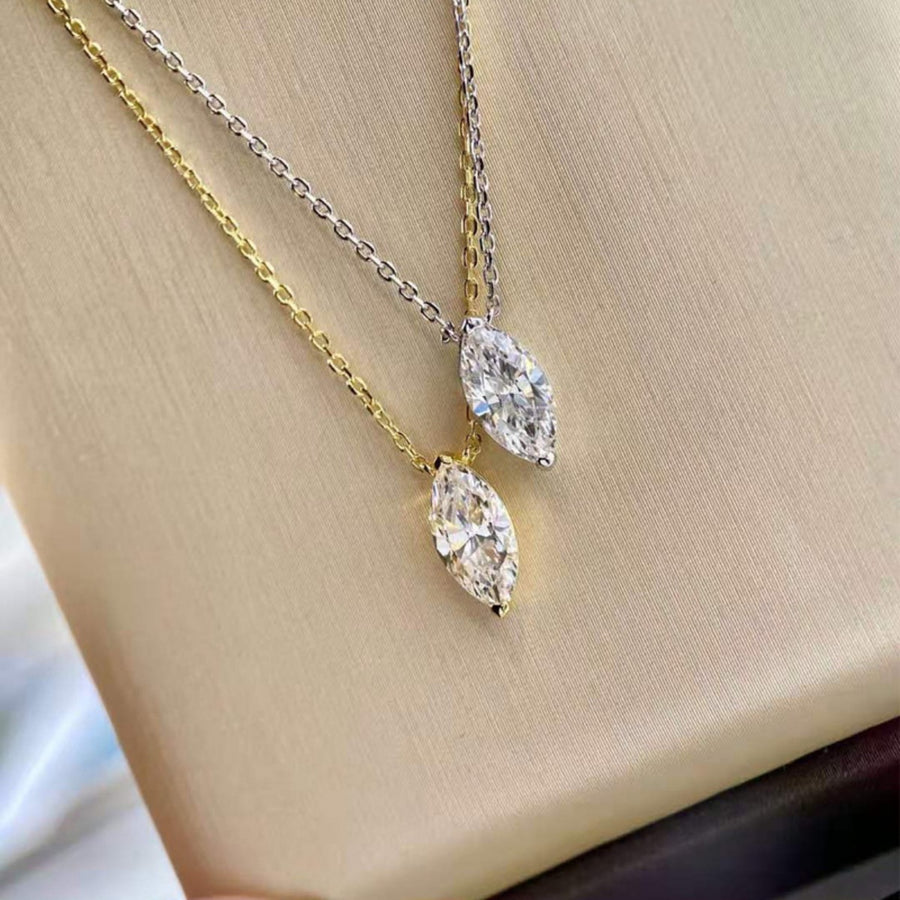 Sterling zircon pendant necklaces in gold and silver with marquise-cut stones.