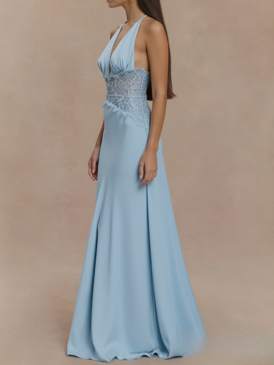 Sky blue halter neck maxi dress with lace trim bodice and flowing skirt.
