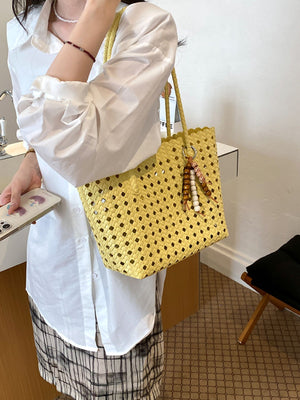 handbag in Yellow with geometric and woven design
