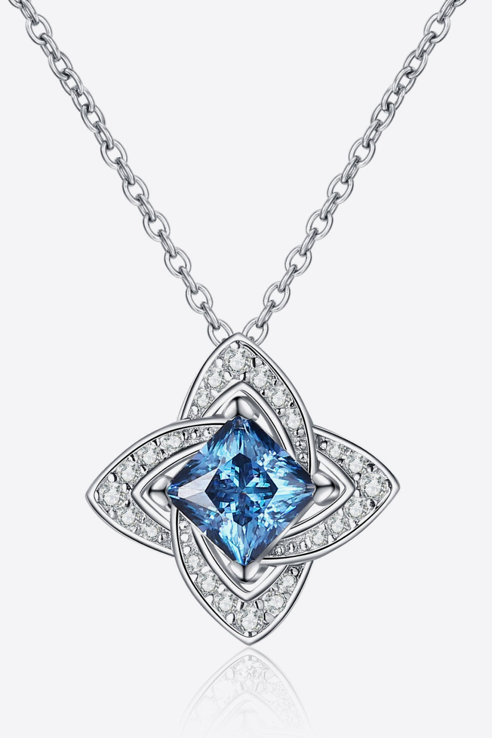 Sky blue moissanite and diamond pendant necklace with floral design
