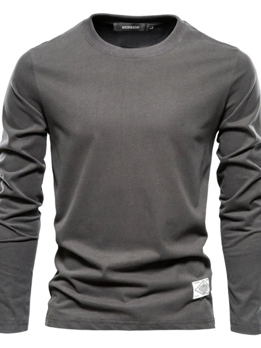 Dark Gray crew-neck long sleeve tee with textured fabric and a diamond patch detail.