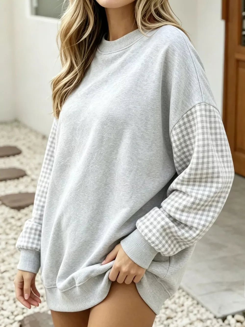 white sweatshirt with ribbed cuffs and long sleeve