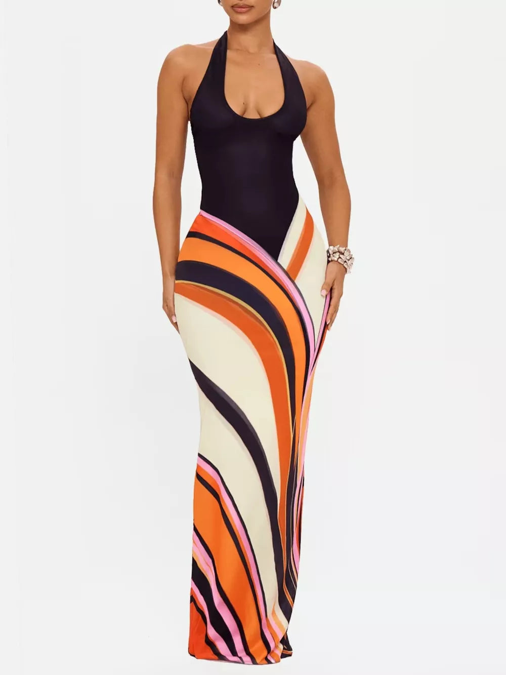 Maxi dress with halter neck and bold orange, pink, and black wavy stripe print skirt.