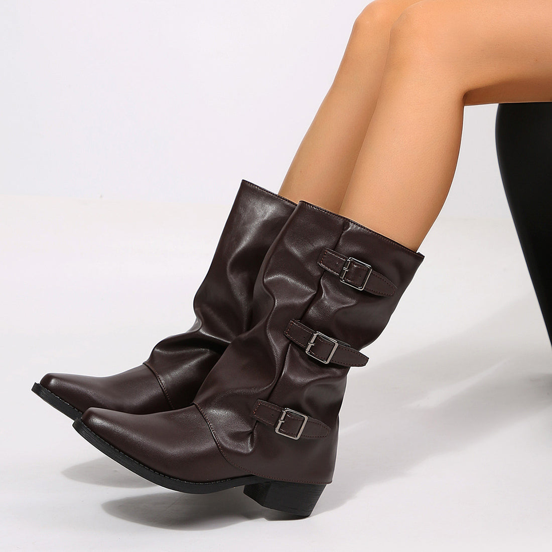 boots in black with point toe and mid-calf