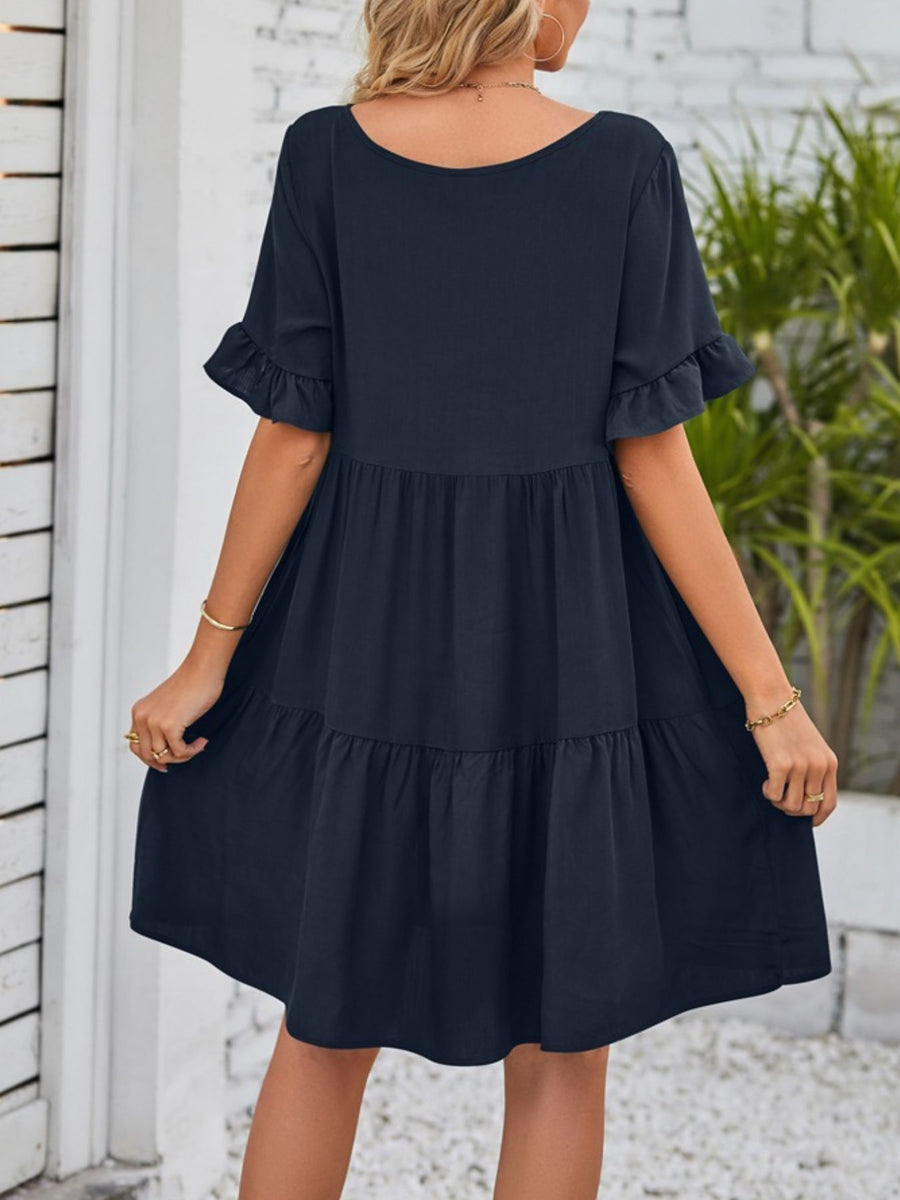 Navy ruffled sleeve tiered mini dress with pockets