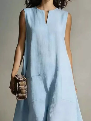 Light blue sleeveless midi dress with V-neck and patch pockets