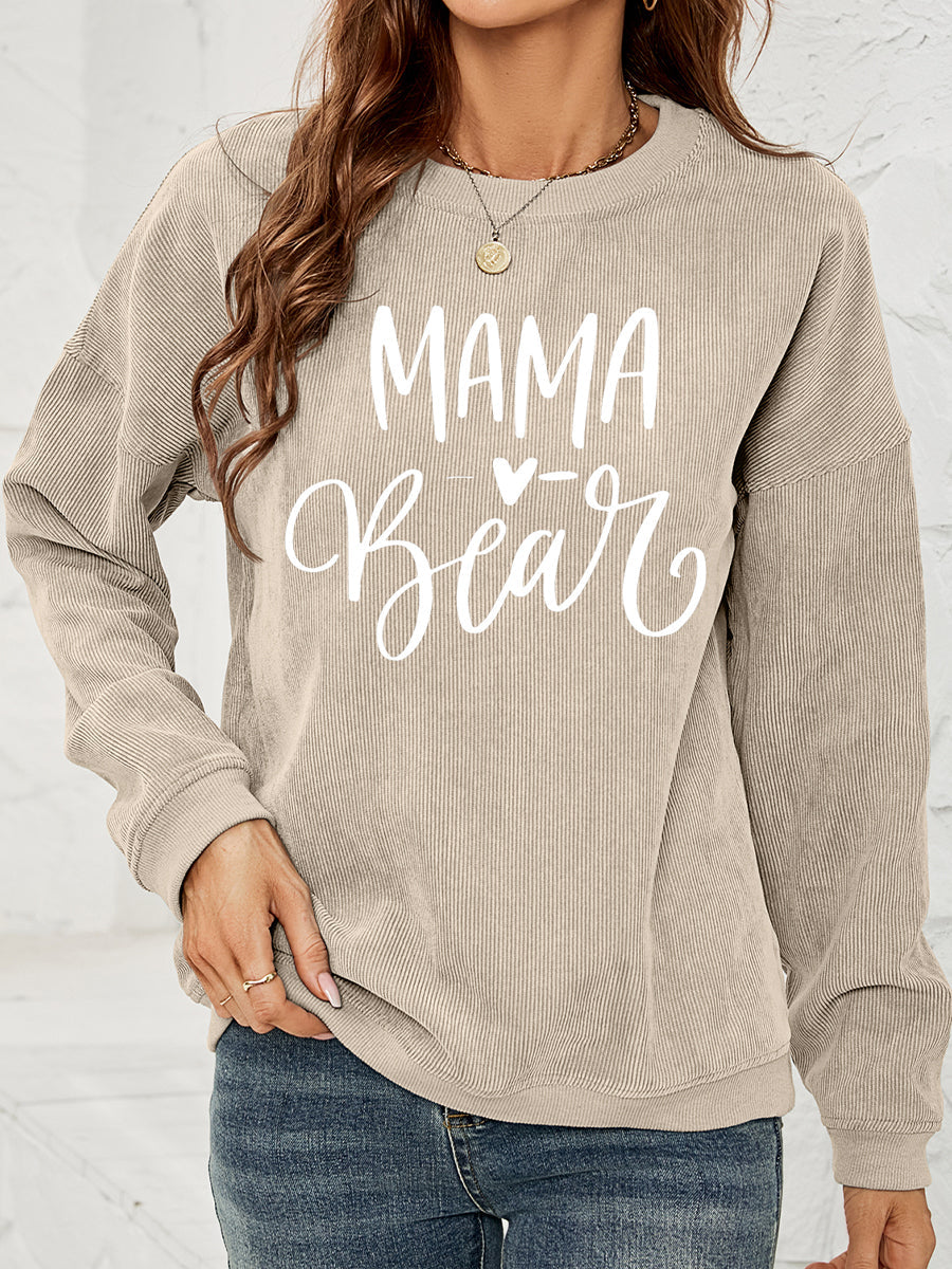 Textured corduroy sweatshirt in Sand with "Mama Bear" graphic.