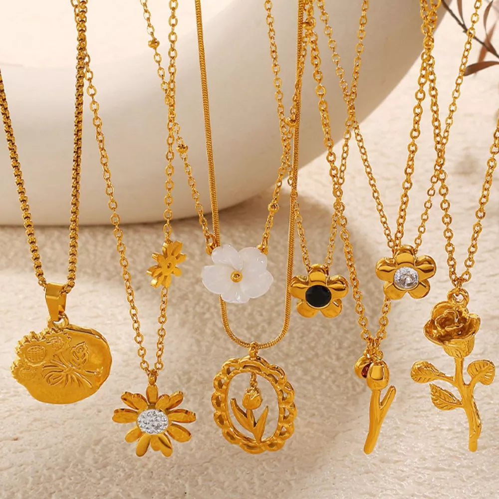 gold necklace with floral and round neck