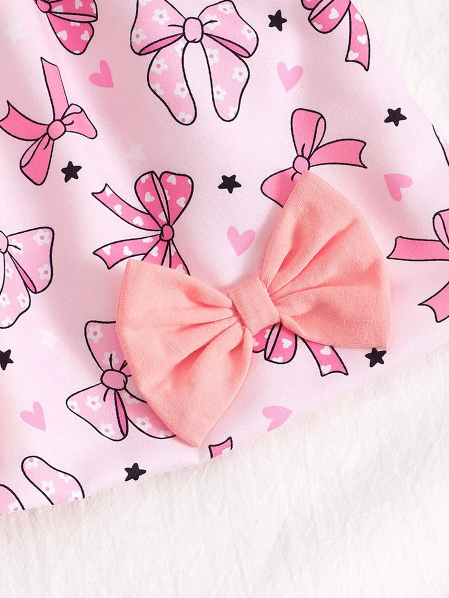 Pink baby dress with bow print and a large pink bow detail.