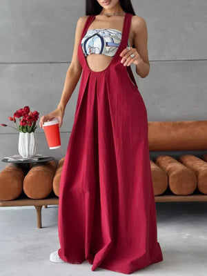 Wine Red pleated overall dress with wide legs and a scoop neckline.