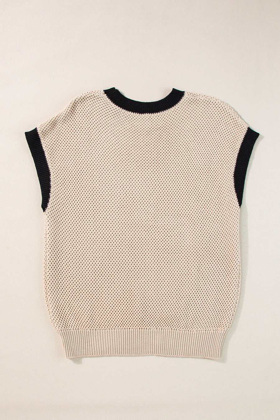 Beige knit cap sleeve top with black trim and crewneck.