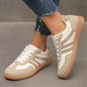 light beige sneakers featuring round toe and color-block