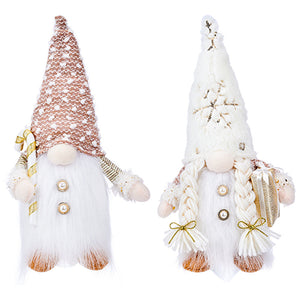 Illuminated festive gnomes, one male with candy cane, one female with gift, battery operated holiday decor.