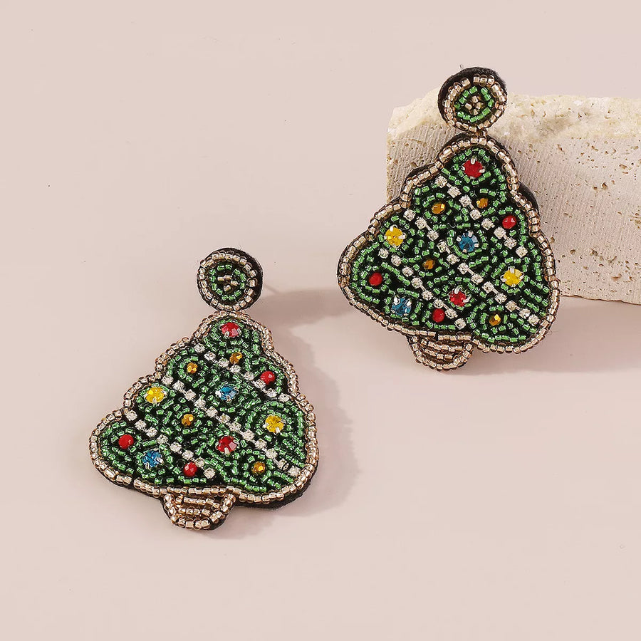 Festive tree dangle earrings in dark green, beaded with colorful crystals and alloy accents.