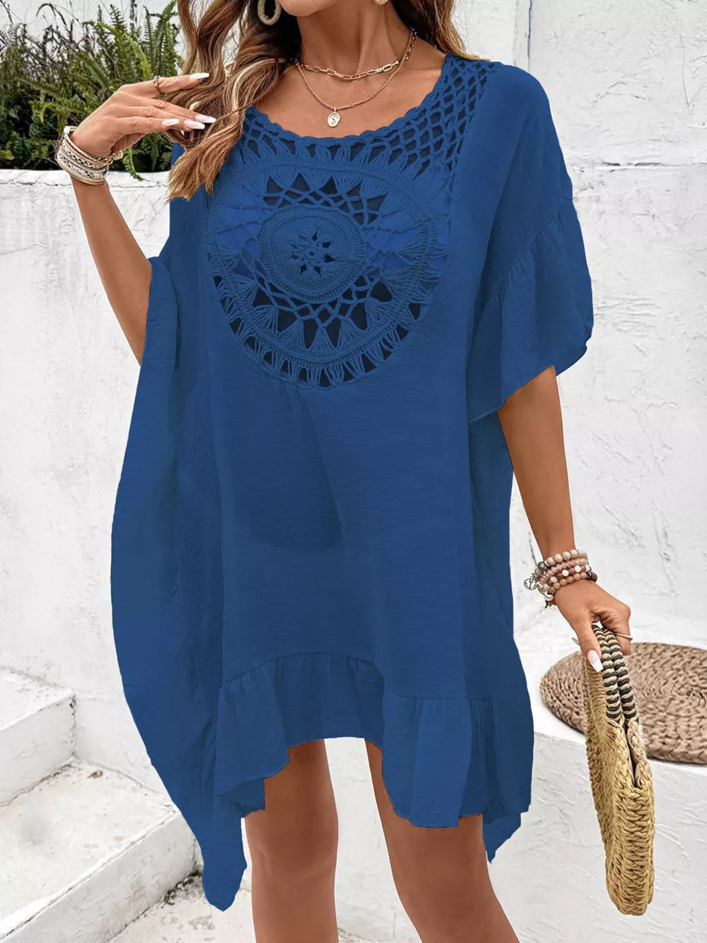 Indigo crochet trim cover-up dress with ruffled hem and short sleeves.