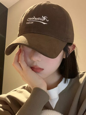 Deep Coffee cotton baseball cap with embroidered white letter detail and curved brim