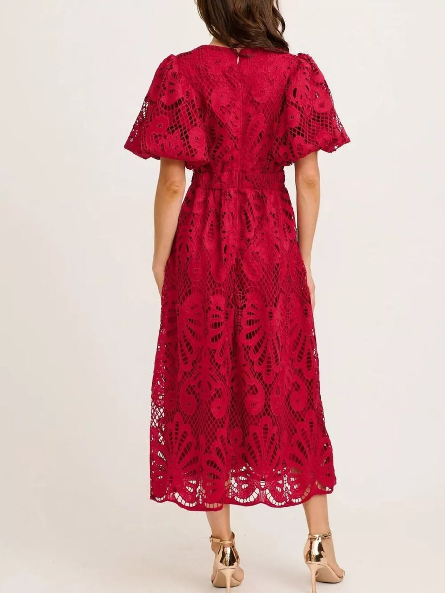 Wine red lace midi dress with puff sleeves and a scalloped hem.