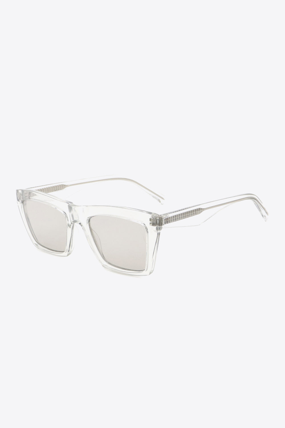 Clear acetate angular sunglasses with light gray lenses and textured temples.