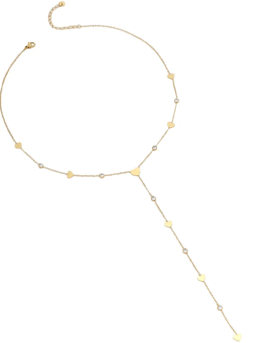 necklace in Gold with geometric and heart charms