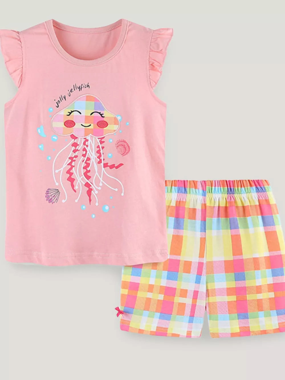 Toddler girl's pink cotton set with ruffled sleeves and jellyfish graphic, paired with plaid shorts.