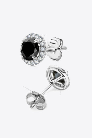 Black diamond halo stud earrings with clear accent stones and silver settings.