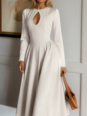 100% polyester Care instructions: Machine wash cold midi dress in Apricot with A-line silhouette
