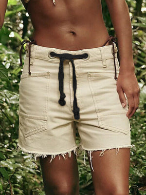 denim shorts in Black with raw hem and mini