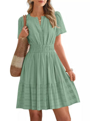 Light Green Textured V-neck Tiered Dress with Smocked Waist and short sleeves.