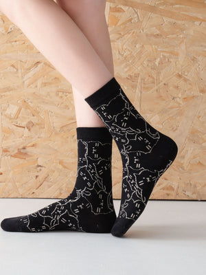 socks featuring cat motif in ivory with cotton Imported Size &amp texture