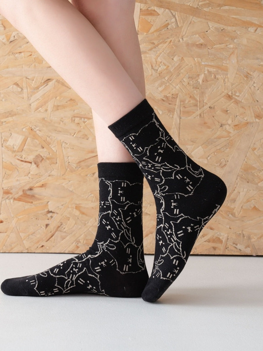 socks featuring cat motif in ivory with cotton Imported Size &amp texture