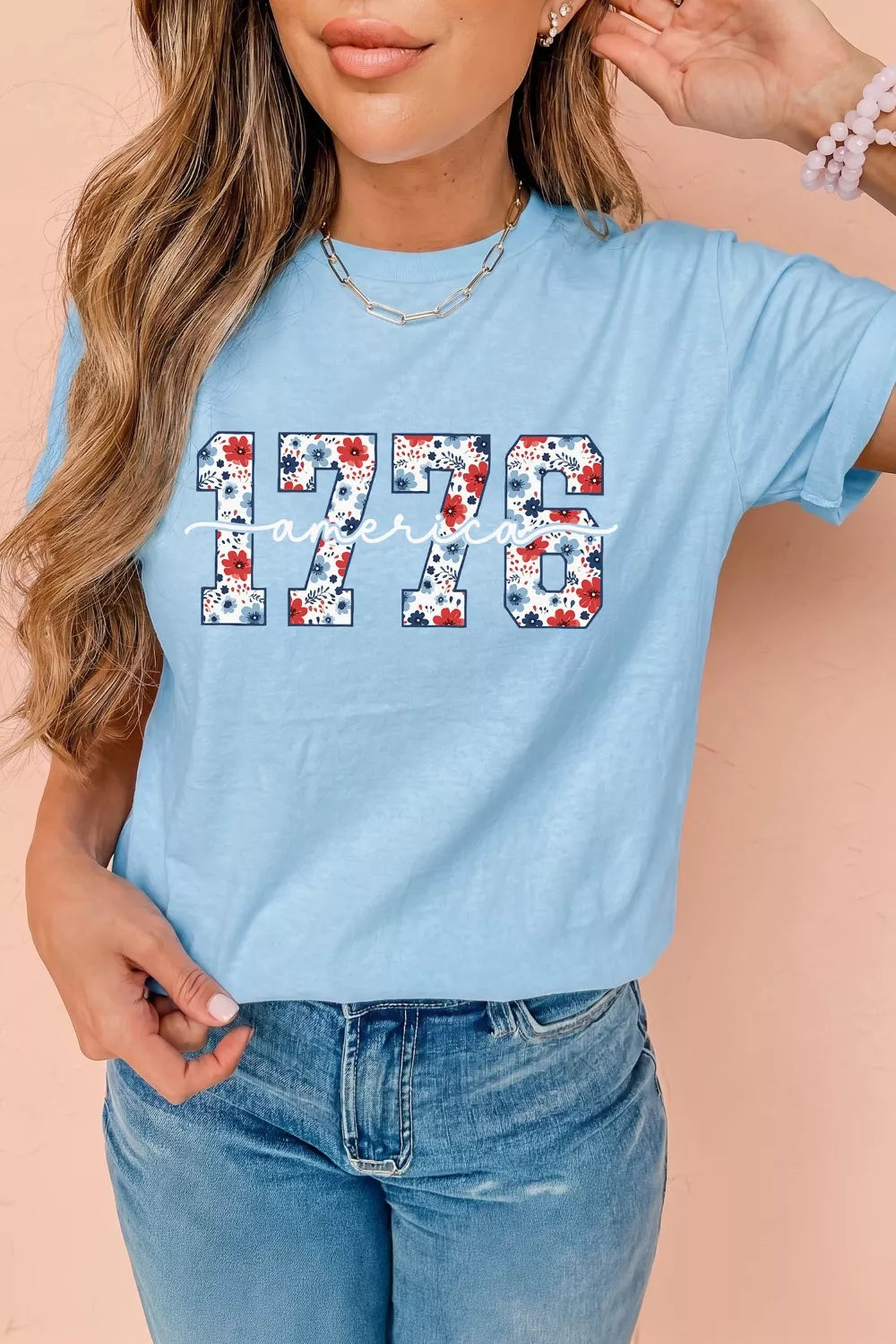Blue cotton relaxed fit t-shirt with floral emblem detail