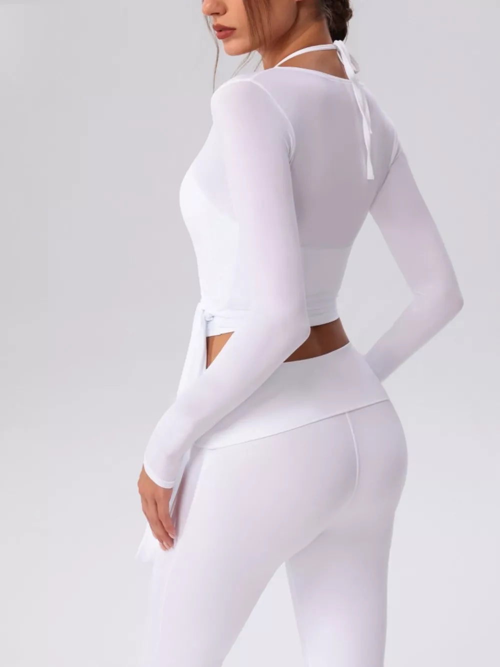 75% nylon, 25% spandex Care instructions: Machine wash cold activewear set in Tan with flared silhouette