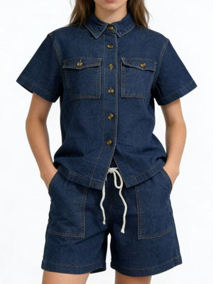 Button-up denim top and shorts set in dark blue with collared neckline and short sleeves.