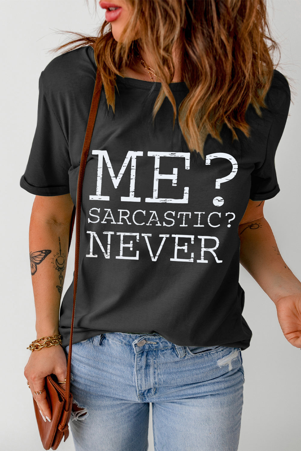 Black graphic t-shirt with white text ME? SARCASTIC? NEVER.