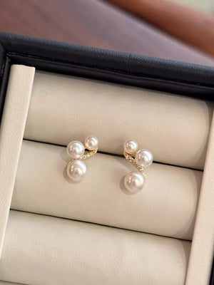 Elegant pearl cluster earrings in gold with diamond accents