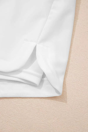 White ribbed-waist relaxed shorts with side slits detail