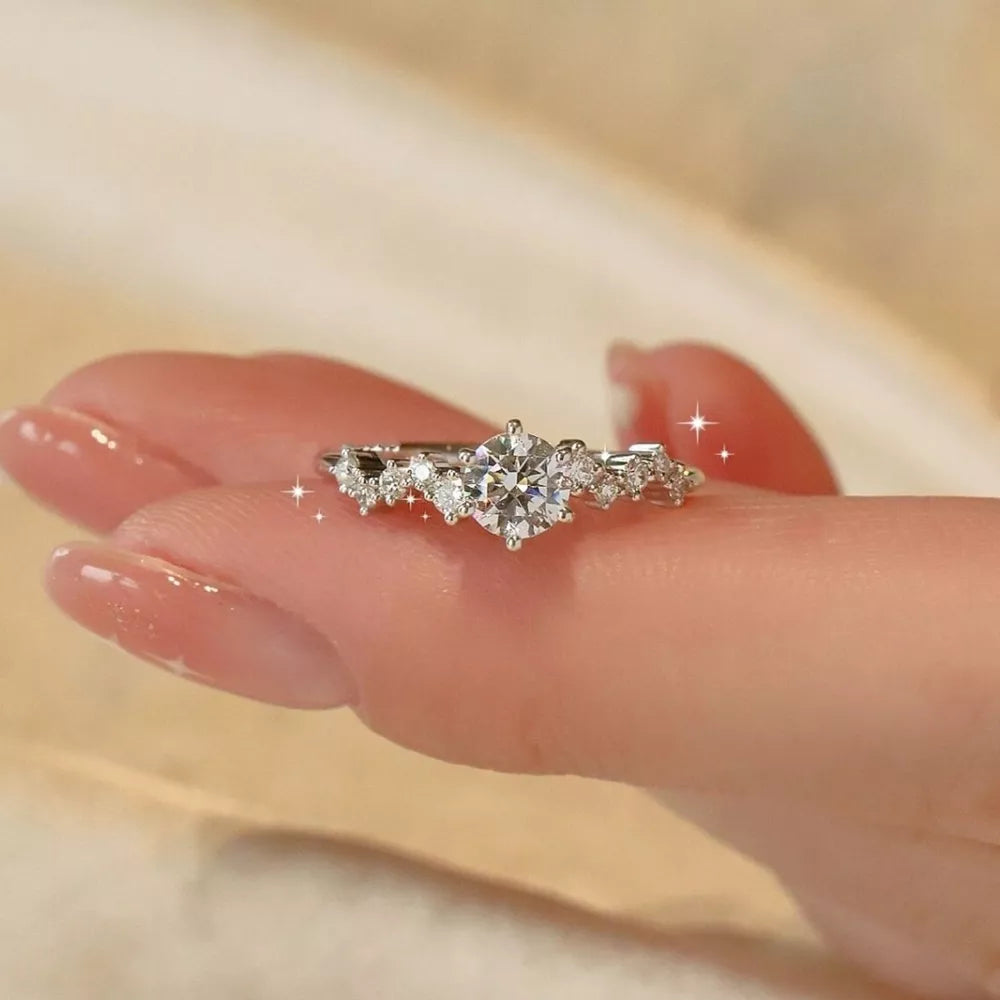 925 sterling silver,Moissanite Carat weight: 1ct Care instructions: Avoid wearin ring in clear with straight silhouette