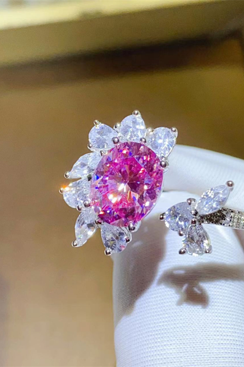 Blossom Halo Pink Crystal Ring with clear petal accents and butterfly design.