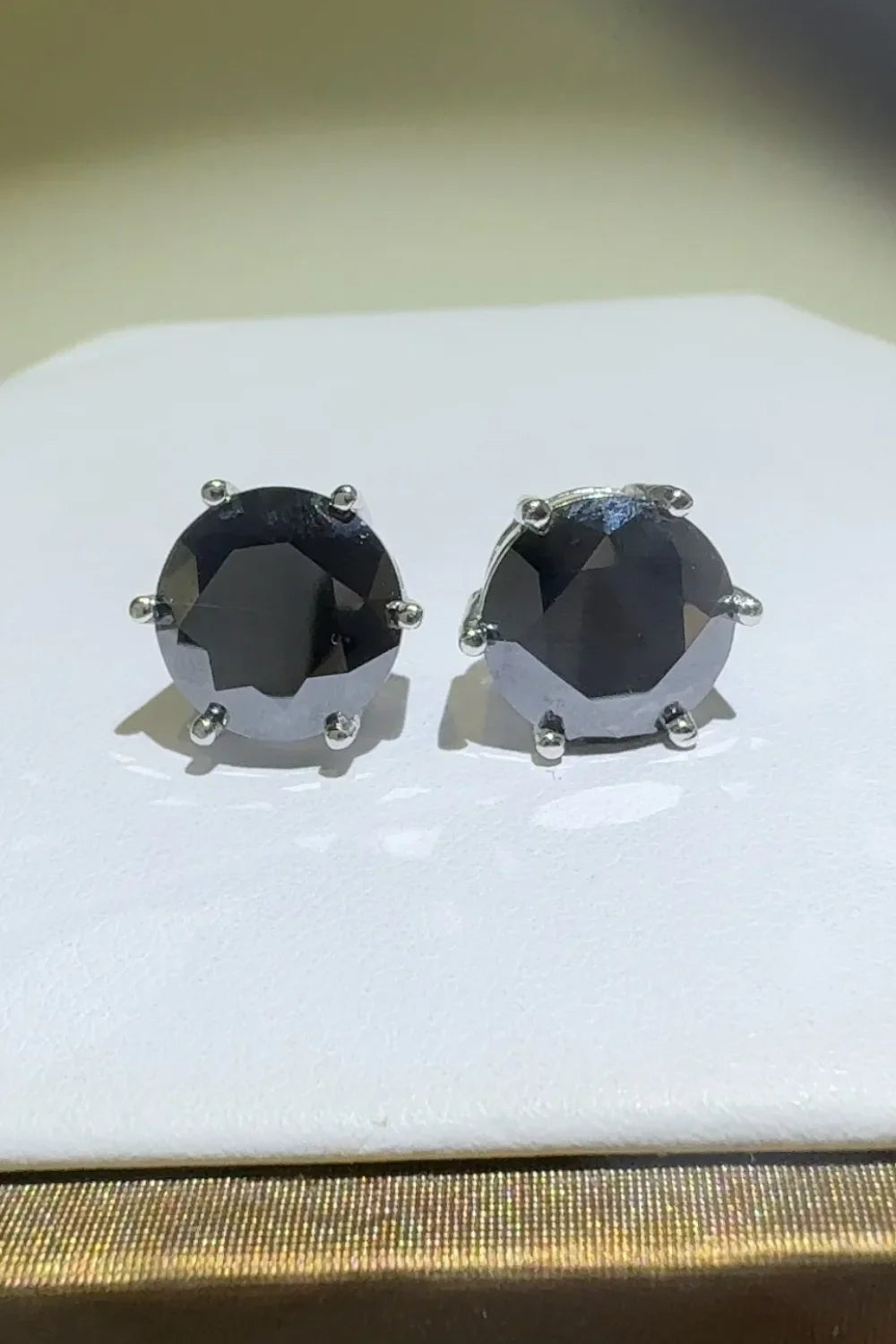 Black moissanite stud earrings with six-prong setting