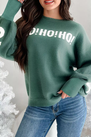 Green graphic long-sleeve sweater with "O!HO!HO!" text, crew neck, and balloon sleeves.
