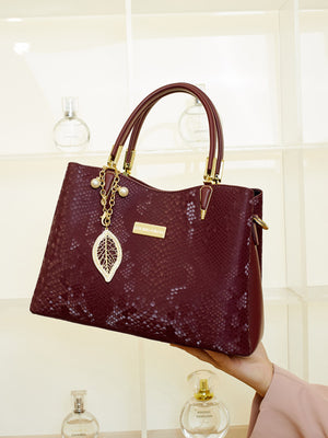 handbag featuring snakeskin in Wine Red with PU Leather Imported Size &amp texture