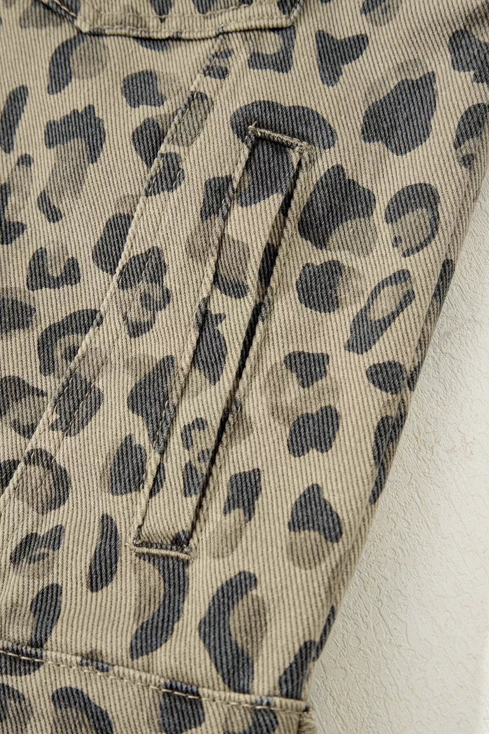 denim jacket featuring leopard-print in charcoal with 60% cotton, 40% polyester Care instructions: Machine wash cold texture
