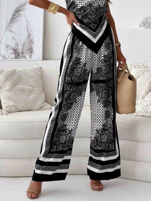 Chic printed cami and wide-leg pants set in black and white paisley and polka dot pattern.