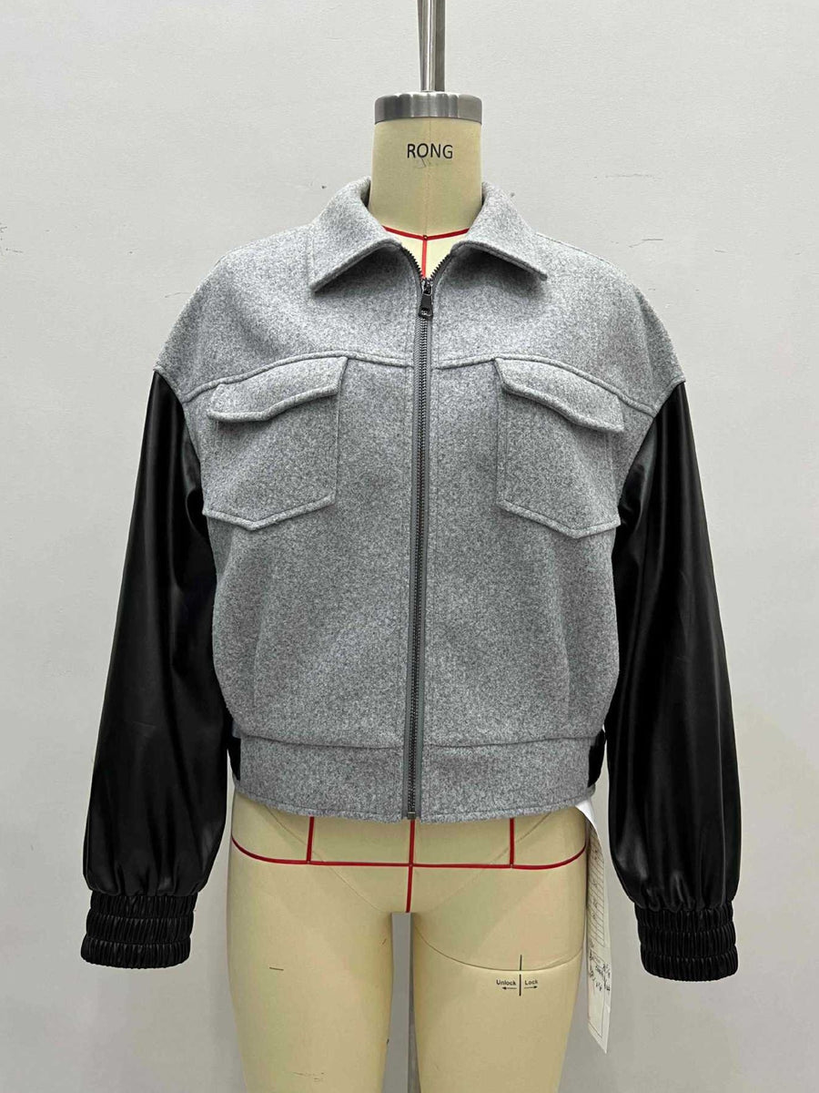 slate gray zip-up jacket with waist-length and zip-front