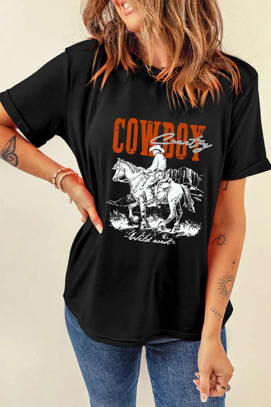 Black graphic tee with cowboy riding horse and country text.