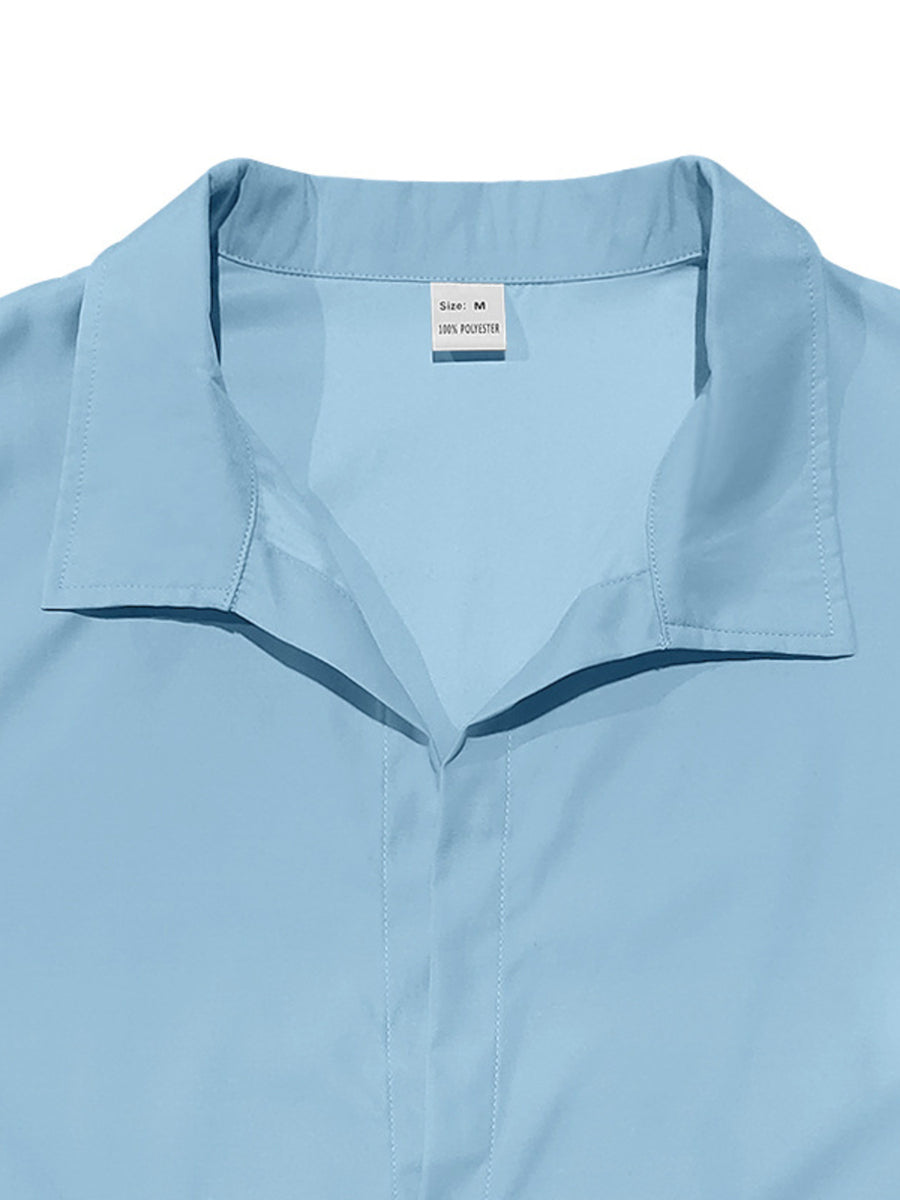 Light blue long-sleeve men's collared shirt with button-down front and polyester material.