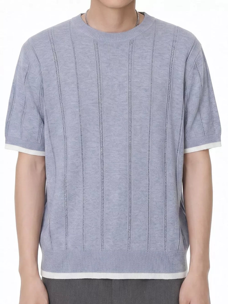 Blue knit t-shirt with crew neck, short sleeves, and white contrast trim.