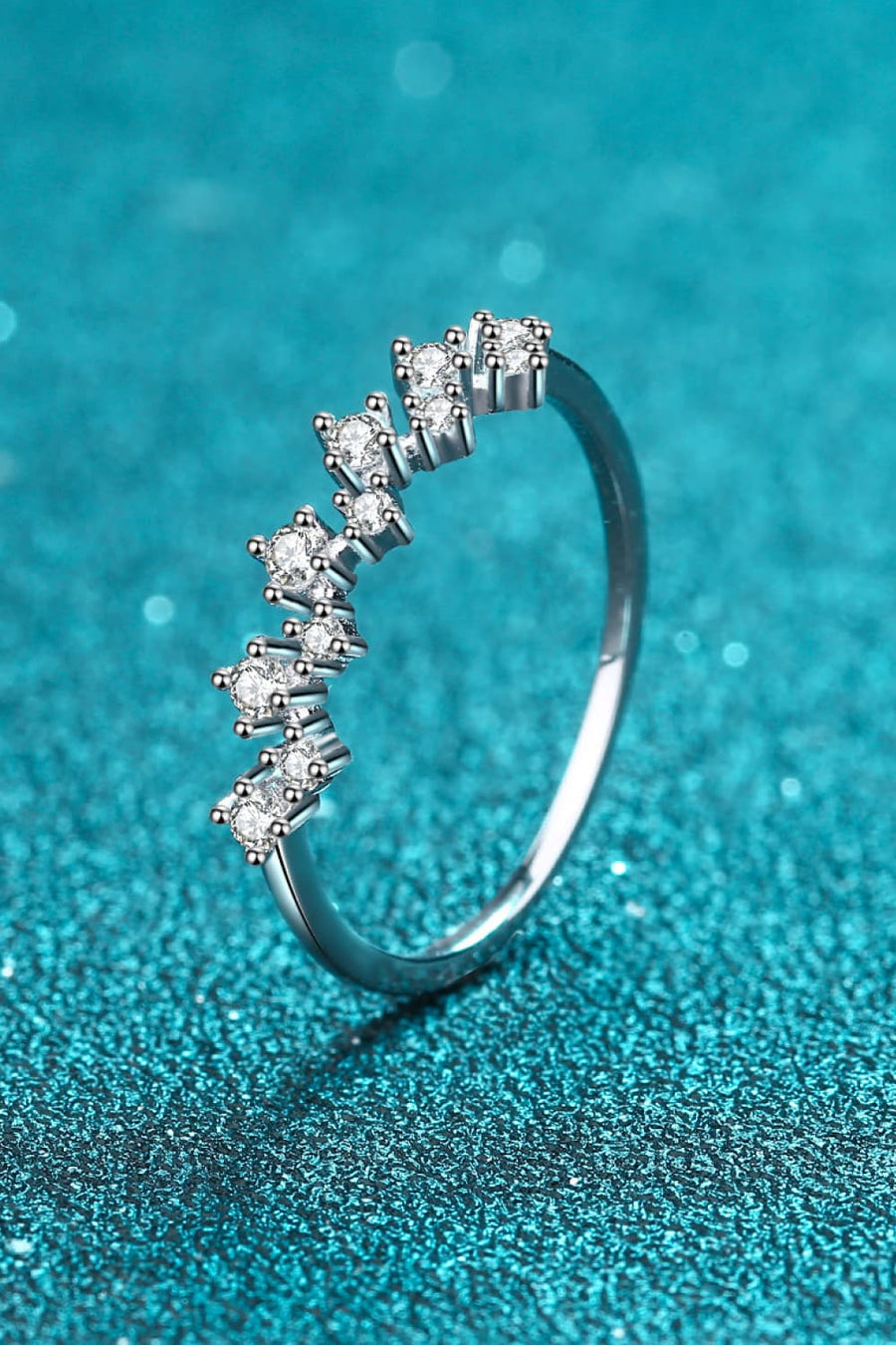 Silver zigzag ring with diamond clusters