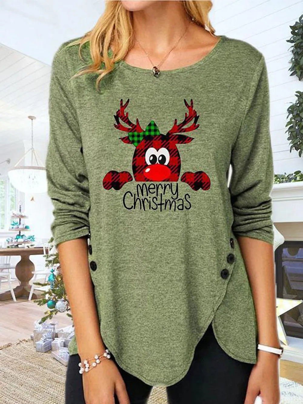 Matcha green asymmetrical tee with reindeer Merry Christmas graphic and button detail
