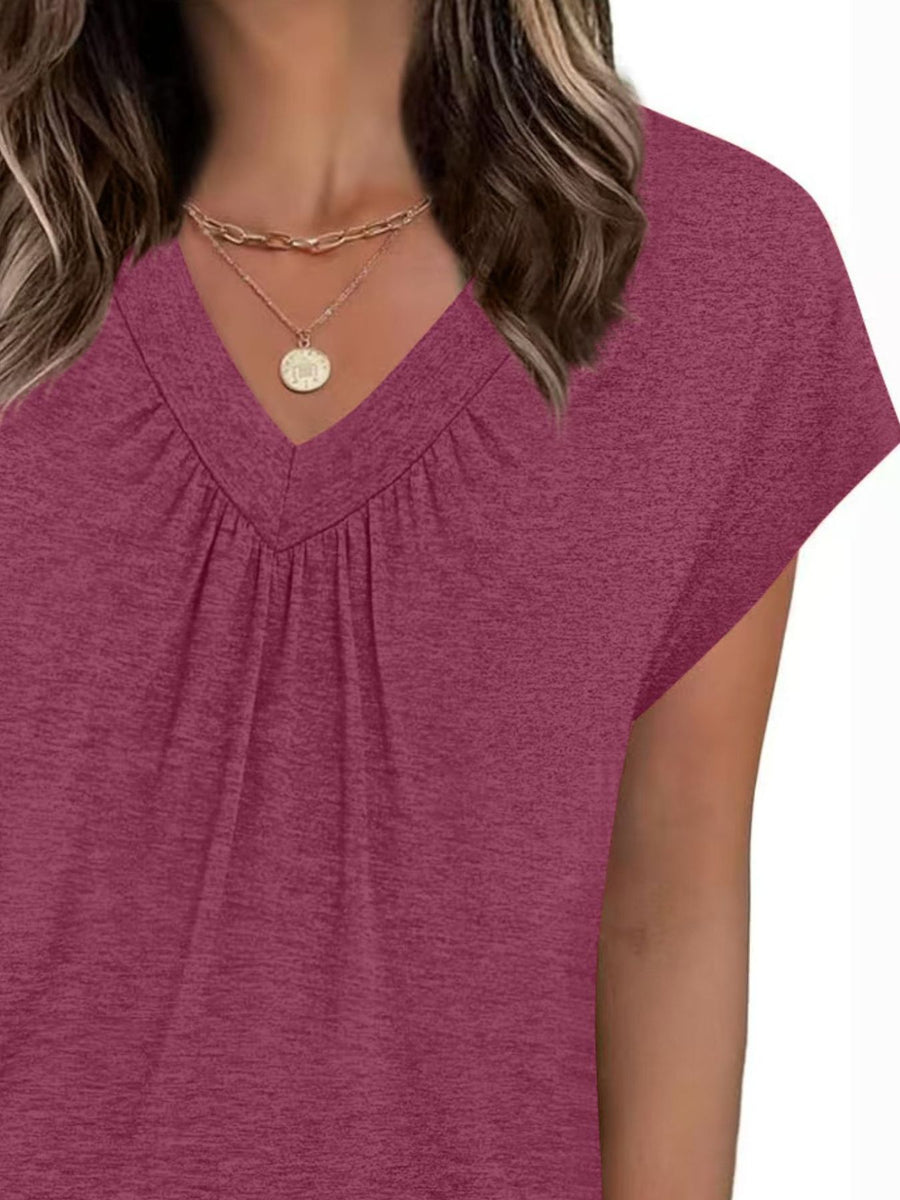 Burgundy ruched V-neck t-shirt with short sleeves and a relaxed fit.